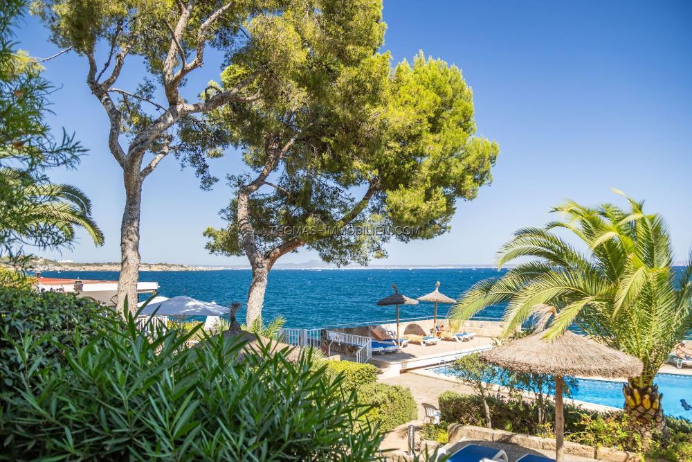 geraeumige-wohnung-mit-weitlaeufigen-gruenflaechen-gemeinschaftspool-und-zugang-zum-meer-in-ses-illetes-auf-mallorca